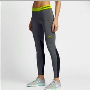 grey and black Nike pro leggings